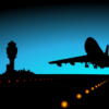 An image that shows the silhouette of an aircraft taking off at an airport at night time.
